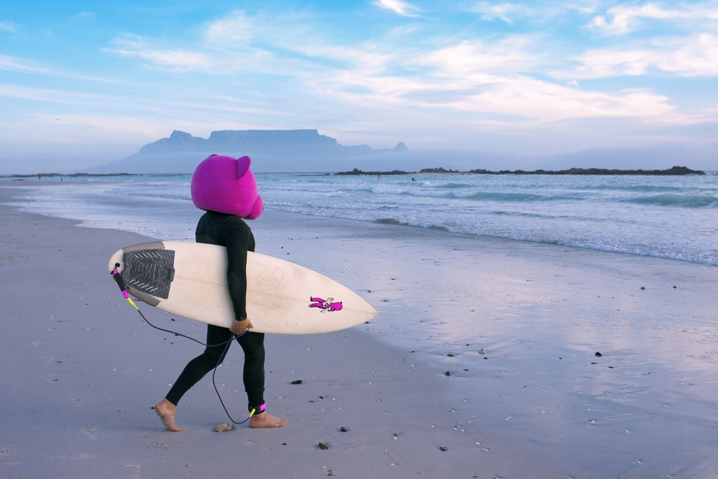 Pink Bear surfing in Cape Town, South Africa