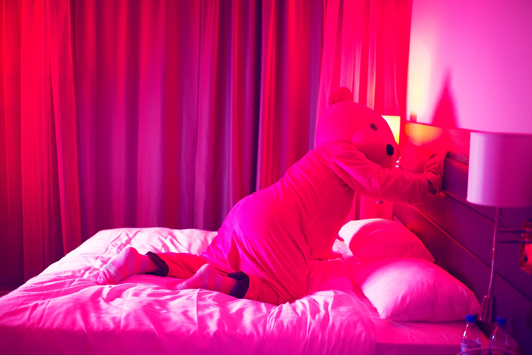 The Bear escapes the box and heads over to the bed. The Bear escapes the box and heads over to the bed.